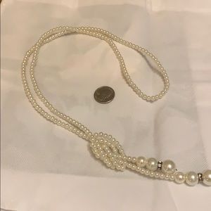 Very nice knotted pearls with rhinestone beads.